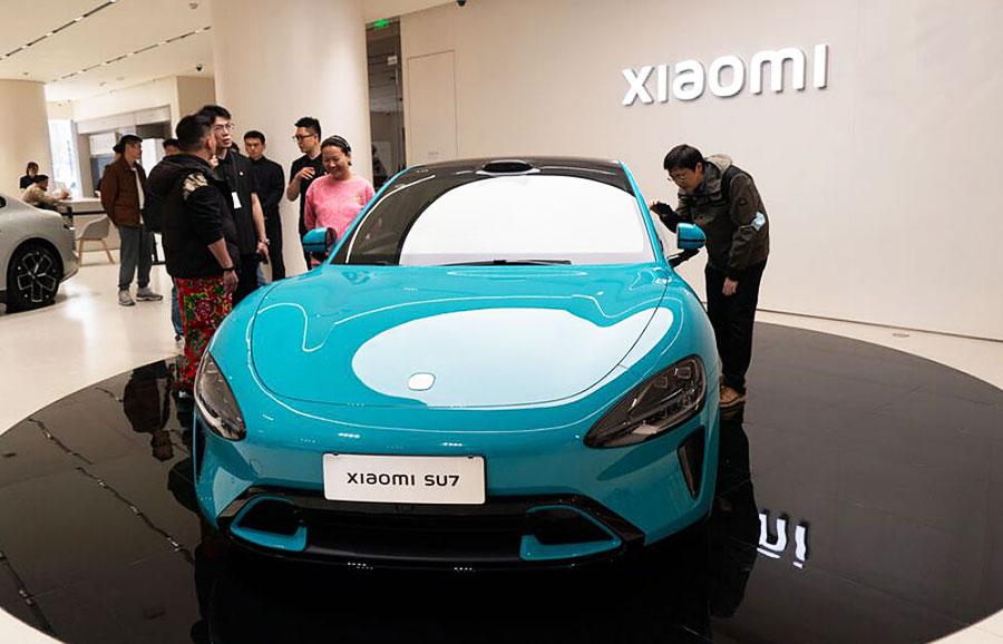 Главная новинка китайского автопрома 2024 г. — электрический седан Xiaomi SU7